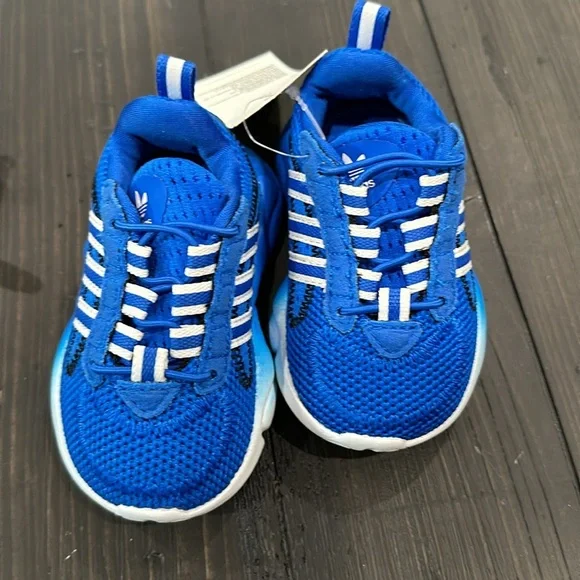 Toddler size 4 shoes. Sperry and Adidas. Adidas are nwt.selling separately.